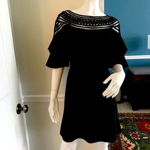 Beatiful, fun dress for summer with lots of beautiful details.